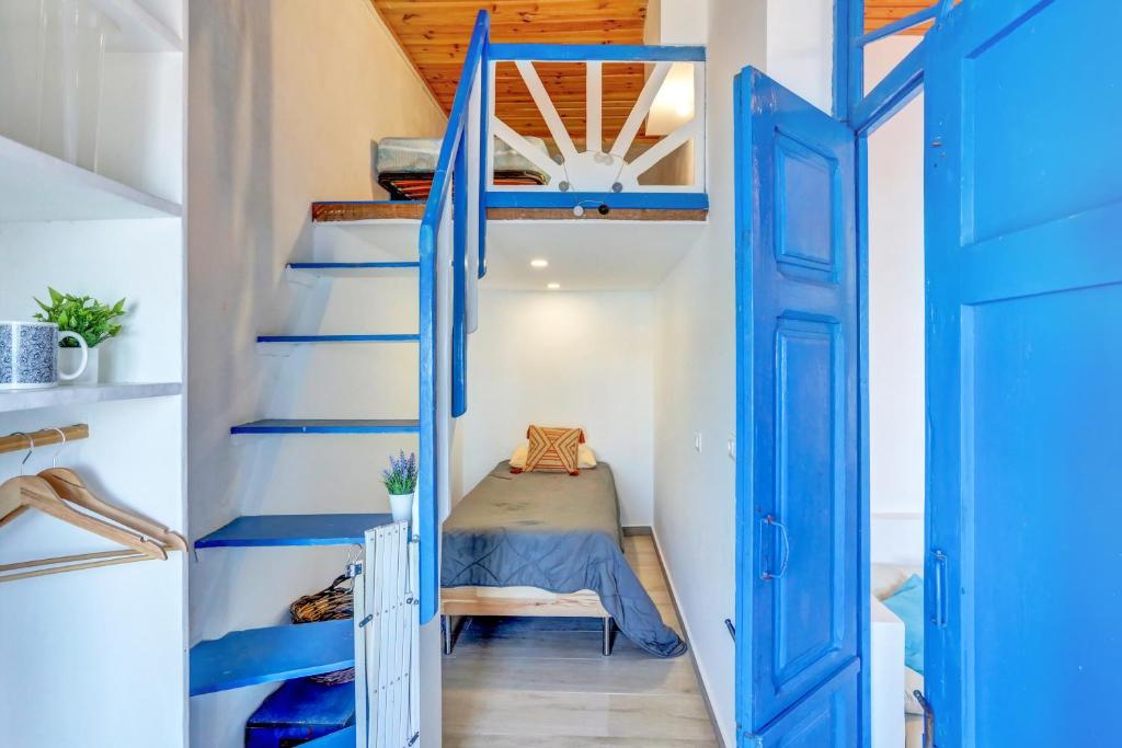La Casa del Capitán - blue-staircase-loft-bedroom